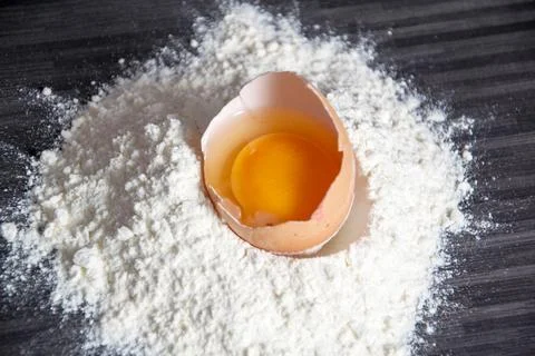 Baking ingredients on dark Stock Photos