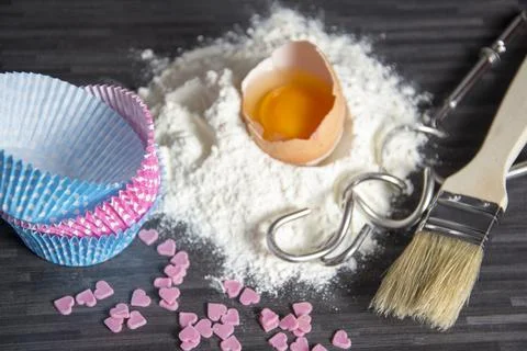 Baking ingredients on dark Stock Photos