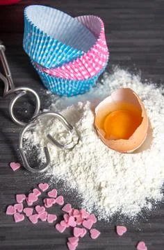 Baking ingredients on dark Stock Photos