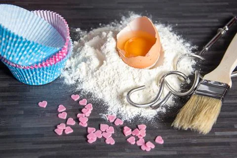 Baking ingredients on dark Stock Photos
