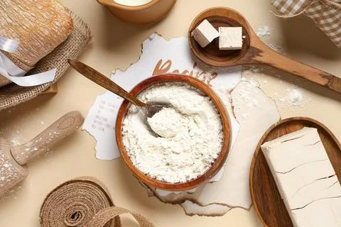 Baking ingredients flat lay with flour, yeast, and recipe for homemade bread  Stock Photos