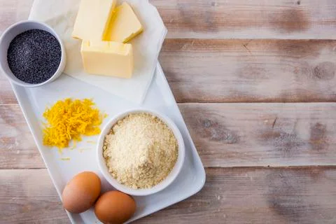 Baking ingredients for a lemon cake - eggs, butter, ground almonds, 写真素材