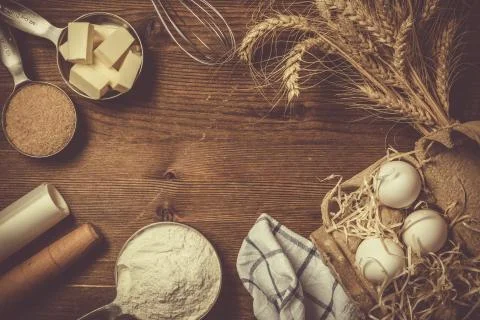 Baking ingredients in measuring cups Stock Photos