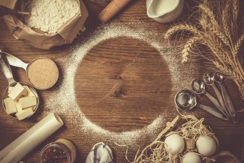 Baking ingredients in measuring cups Stock Photos