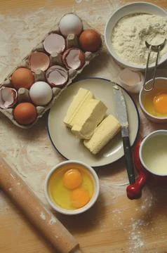Baking ingredients on a table Stock Photos