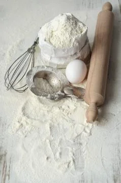 Baking ingredients on a table Stock Photos