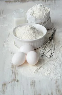 Baking ingredients on a table Stock Photos