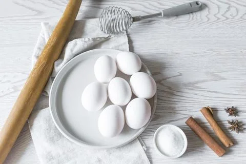 Baking ingredients.eggs in plate. Easter composition. Bakery, cooking recipe Stock Photos