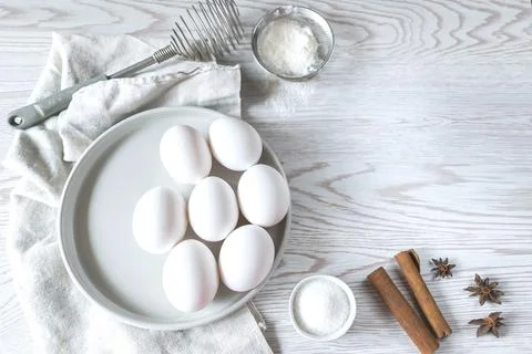 Baking ingredients.eggs in plate. Easter composition. Bakery, cooking recipe Stock Photos