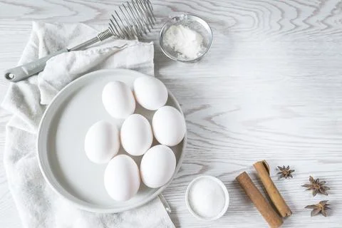 Baking ingredients.eggs in plate. Easter composition. Bakery, cooking recipe Stock Photos