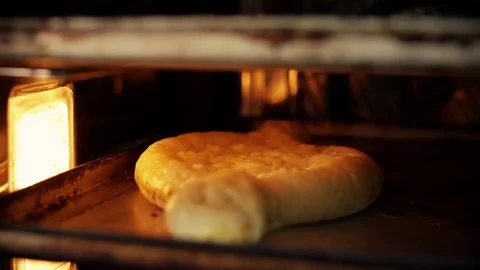 Baking of khachapuri in slow motion Stock Footage 82042972