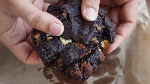 Baking a large chocolate cookie with a unique texture Stock Footage 337334560