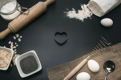 Baking love. Bakery background. Baking ingredients and kitchen utensils on th Foto stock