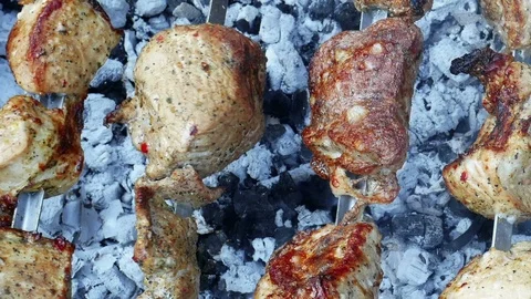 Baking meat on metal rods Stock-Footage 87958675