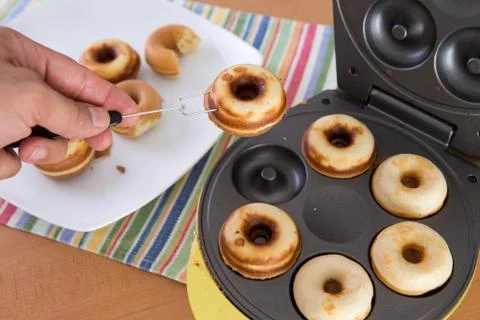 Baking mini donuts Stock Photos