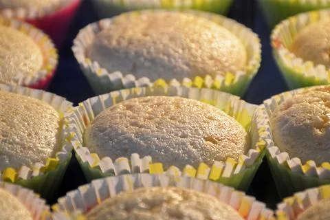 Baking muffins in oven, selective focus Foto stock