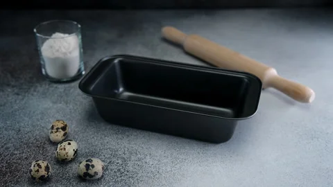 Baking Pan and Rolling Pin Setup Stock Footage 273700794