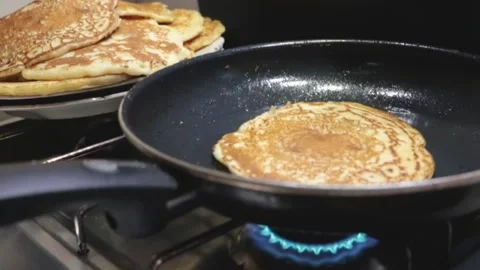 Baking pancakes zoom Stock Footage 231872443