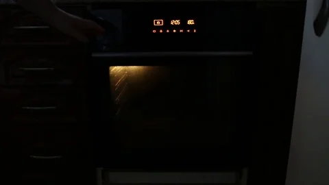 Baking pies in a flame cupboard Stock Footage 83454423