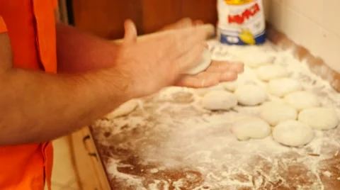 Baking pies in home kitchen.. Flour, dough and meat Stock Footage 61670035