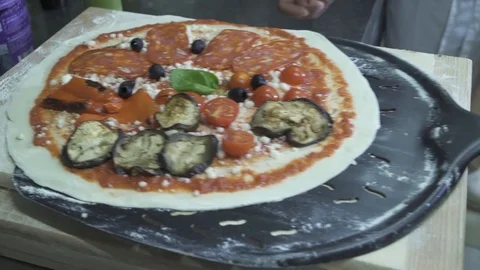 Baking Pizza in the Oven Video stock 85884853