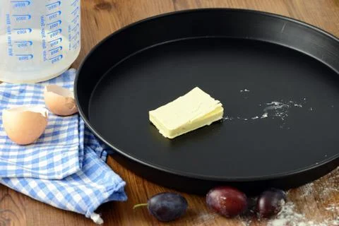 Baking a plum cake Foto stock