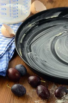 Baking a plum cake Stock Photos