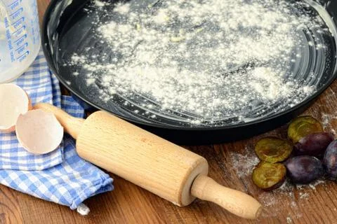 Baking a plum cake Stock Photos