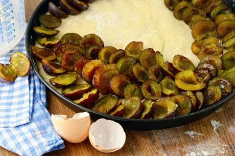 Baking a plum cake Stock Photos