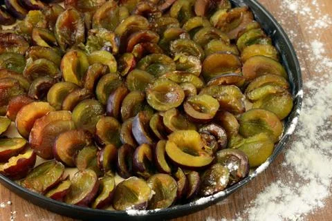 Baking a plum cake Stock Photos