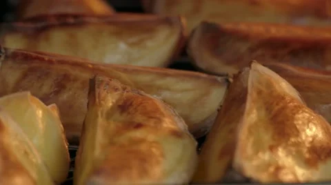 Baking potato slices on grill Stock Footage 68618702
