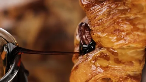 Baking is poured with maple syrup vertical video Stock Footage 260867769