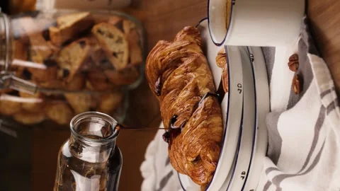 Baking is poured with maple syrup vertical video Stock Footage 260867790