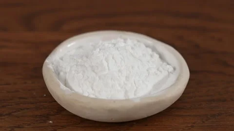 Baking powder on the plate Stock Footage 183510657