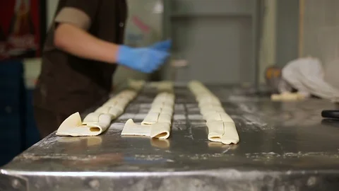 Baking process in the Greek bakery Stock Footage 106477260