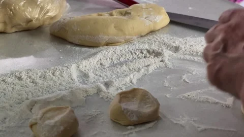 Baking process preparing dough in kitchen countertop focused and methodical Video stock 343515547