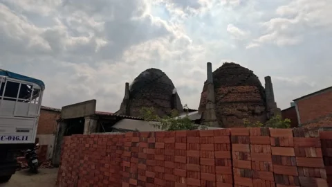 Baking production bricks from clay on a small village factory, Vinh Long Vietnam Stock-Footage 244198457