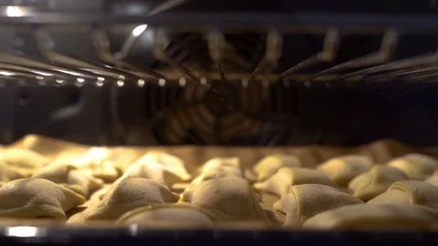 Baking puff pastry in oven Stock Footage 127564641