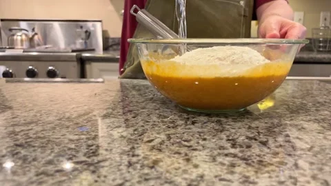 Baking Pumkin Bread Mixing Flour into Batter 2 Stock Footage 320086577