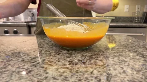 Baking Pumkin Bread Mixing Flour into Batter 1 Stock Footage 320086603
