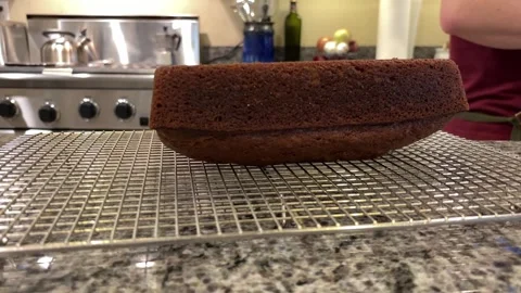 Baking Pumkin Bread Removing pumpkin bread from Pan Slow Stock Footage 320086216