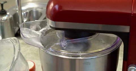 Baking, putting flour into stand mixer Stock Footage 58769150
