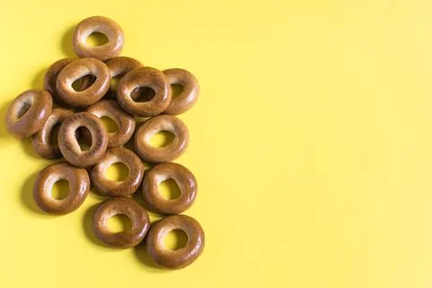 Baking round bagels on a light background top view Stock Photos