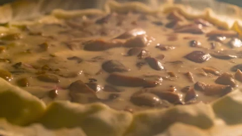 Baking rustic cake with mushrooms, cooked ham and bechamel - Timelapse Stock Footage 260230408