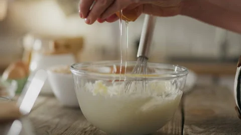 Baking sheet. The expectant mother prepares homemade cakes in the kitchen. A 스톡 동영상 253181079