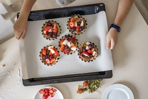 Baking sheet full of summer dessert ready to cooking at home Stock Photos