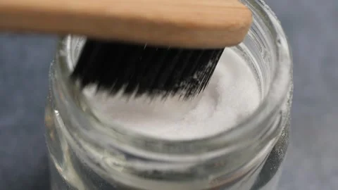 Baking soda and a tooth brush Stock Footage 312424259