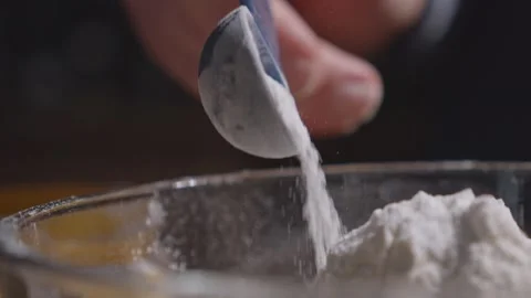 Baking soda falling slow motion Stock Footage 149944935