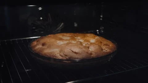 Baking sponge cake in the oven. Stock Footage 146908537