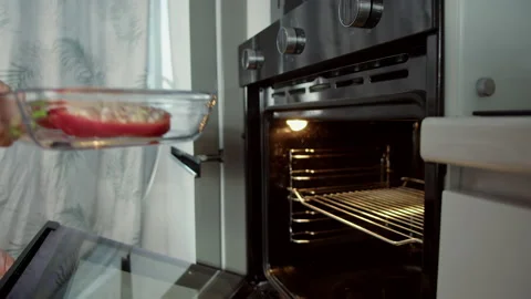 Baking stuffed bell peppers Stock Footage 165266785